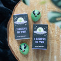 Set of 24 Glass Alien Token Gifts in Display